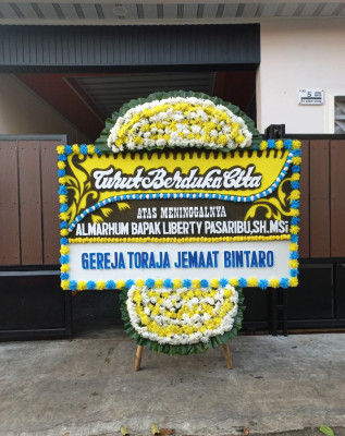 Papan Bunga Duka di Kare